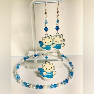 Beautiful blue crystal and white pearl Hello Kitty bracelet and earrings set